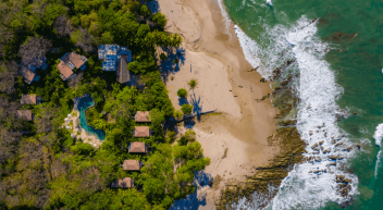 Aerial view of beach and forest coastline. Aerial view of beach and forest coastline.